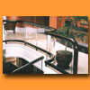 glass guardrail with bronze top rail